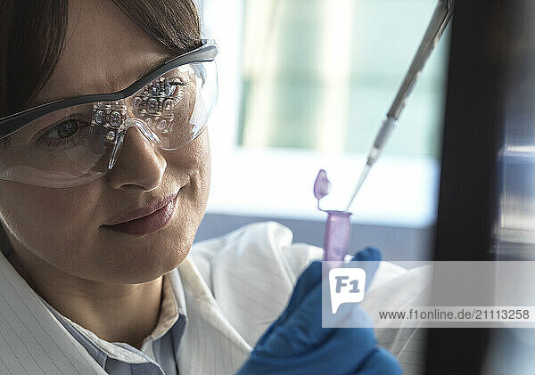 Scientist working on test samples in laboratory