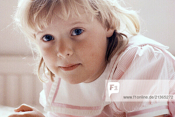 Indoor portrait of young girl child.