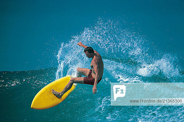 Lifestyle. Sport. Man surfing.