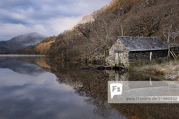 Early morning mist clearing from Llyn Dinas  Nant Gwynant  Snowdonia National Park  Eryri  North Wales  United Kingdom  Europe