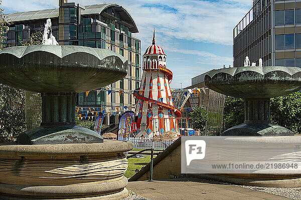 Helter-skelter feature in Summer By The Seaside event in the Peace Gardens  Pinstone Street  Heart of the City  Sheffield  Yorkshire  England