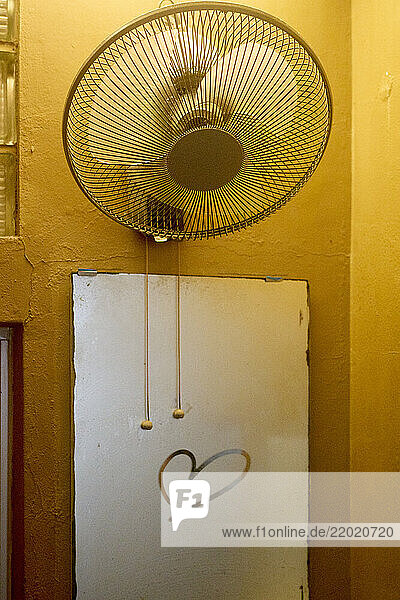 A ceiling fan above a foggy mirror with a heart drawn on  Japanese Alps  Shiba Onsen