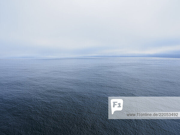 Overcast sky above calm sea