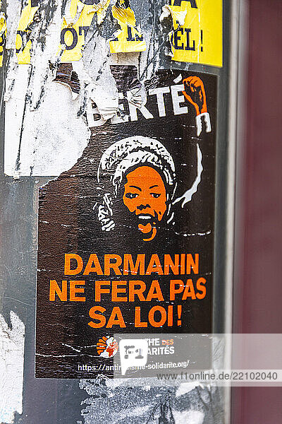 Poster for the Solidarity March with the slogan: Darmanin will not make his law