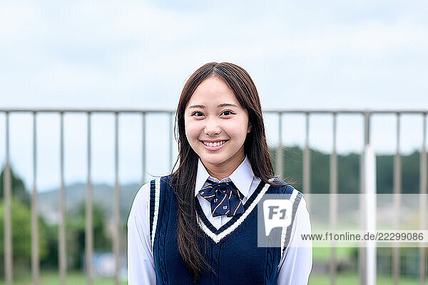 Japanese High School Student In Uniform Outside