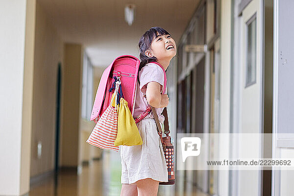 Japanese Kid At School Hallway