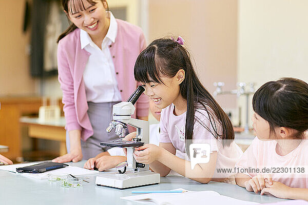 Japanese Kids In Science Classroom