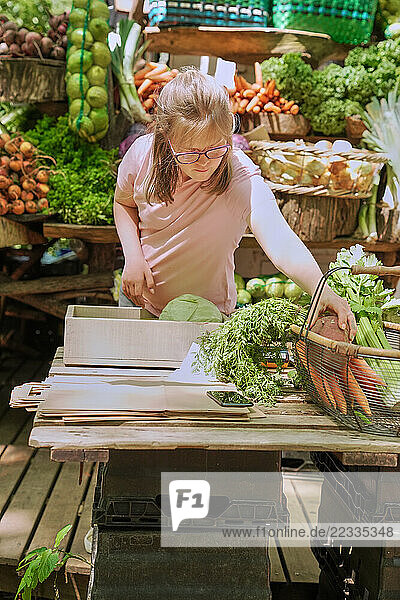 Disabled woman working at farmers market