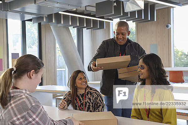 Disabled people enjoying pizza
