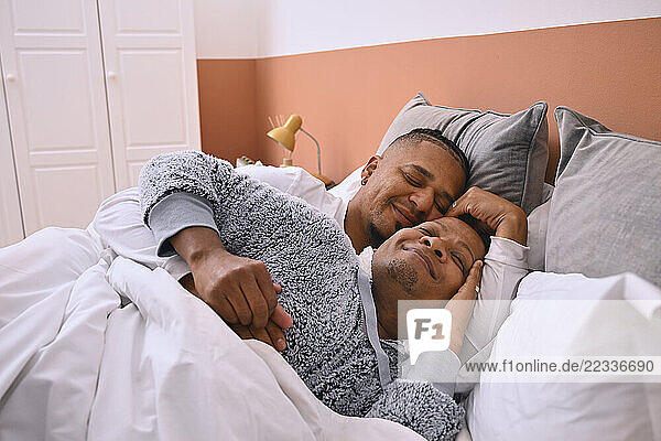 Gay couple in bed