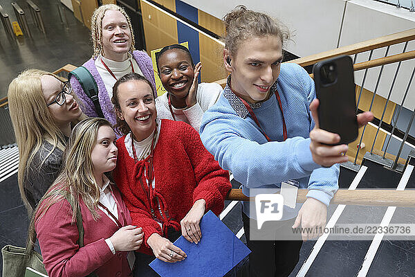 Disabled friends taking selfie in community center