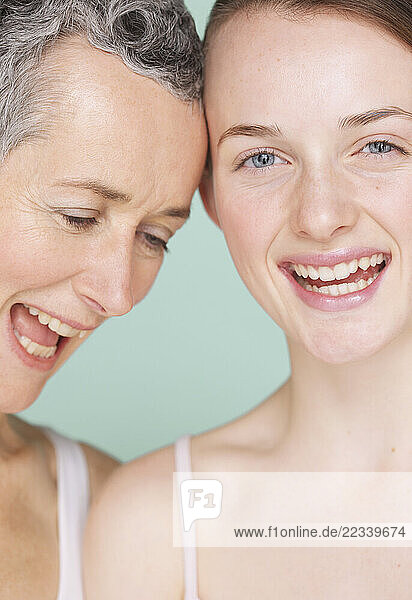 Smiling Mother and Daughter