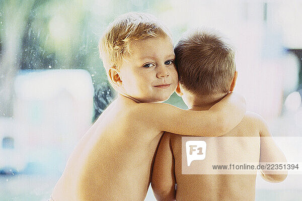 Two Boys Hugging