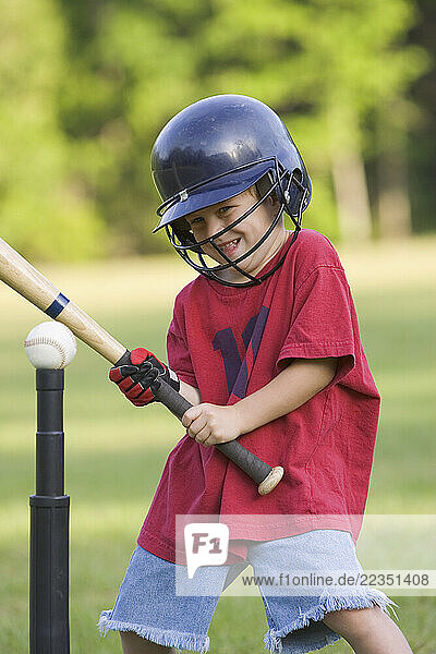 Boy Swinging Bat