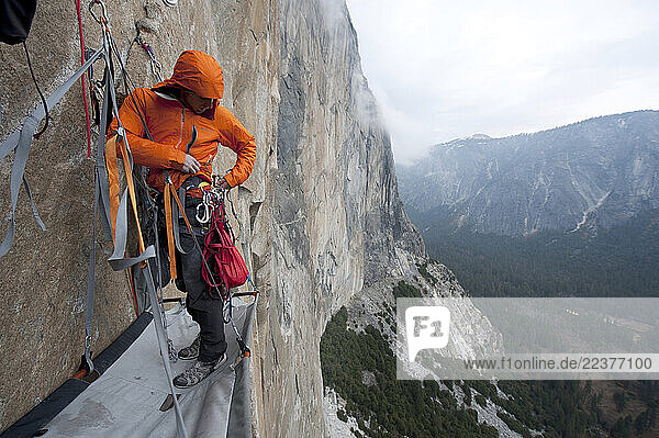 Tommy Caldwell reviews his gear on a portaledge on The Dawn Wall in Yosemite National Park  California.