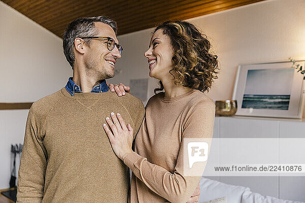Happy affectionate couple at home