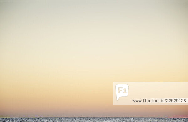 Gradient color of setting sun on Cape Cod Bay