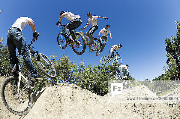 Mountain biker Dave Smutok pulls off a one-handed 360 at the Highland Mountain jump park.