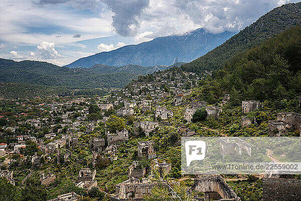Kayakoy greek ghost town overlooking lush valley in Fethiye