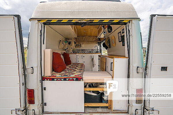 Cozy camper van interior overlooking Cappadocia landscape in Tur