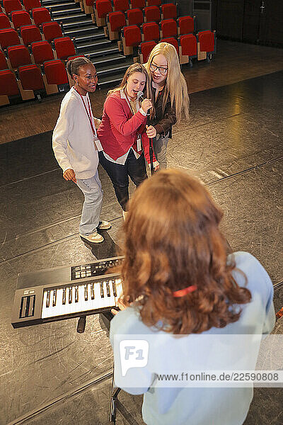 Persons with disabilities performing music on stage