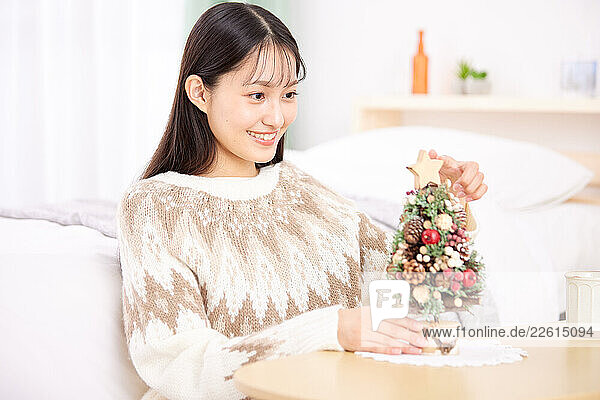 Young Japanese woman at home
