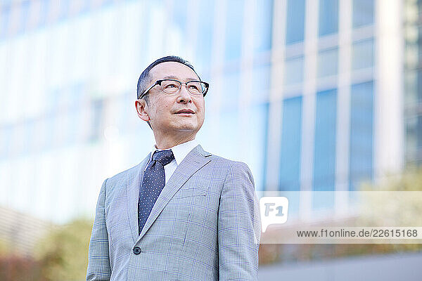 Japanese businessman outside