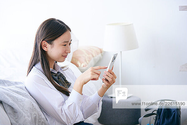 Japanese schoolgirl in bed