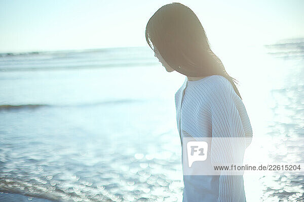 Young Japanese woman at the beach