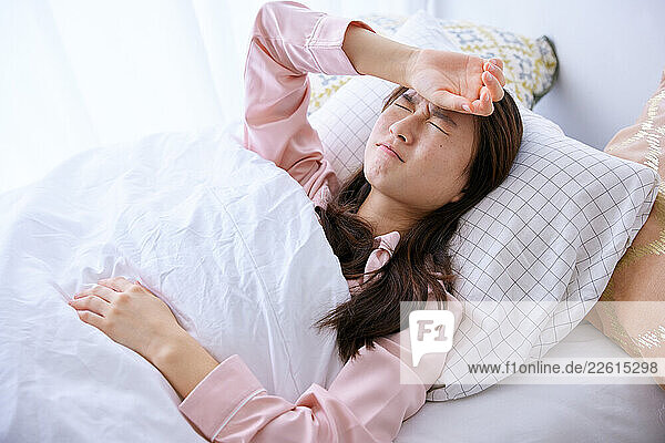 Japanese schoolgirl in bed