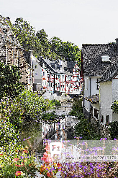 Scenic view of Monreal with historic half-timbered houses along the river Elz in Rhineland-Palatinate  Germany