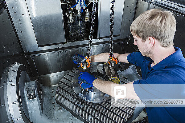 Engineer working on machinery in an industrial plant