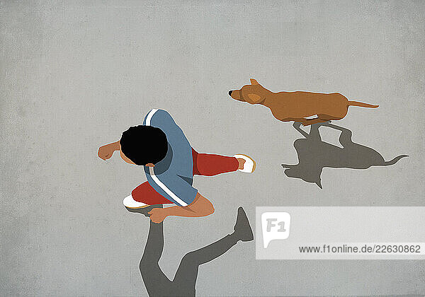 View from above man jogging with dog