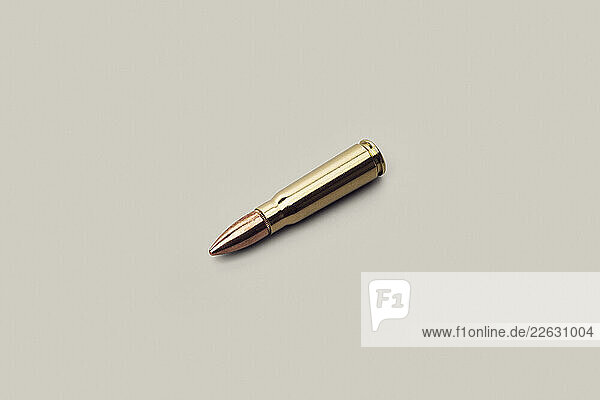 Studio shot 7.63 x 39mm bullet used with AK-47 on white background