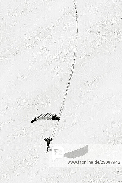 One skier with hand-glider during El Dorado Freeride competition Andorra.