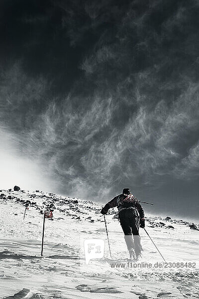 A man walking on Elbrus Mountain during Elbrus Race the highest race in Europe.
