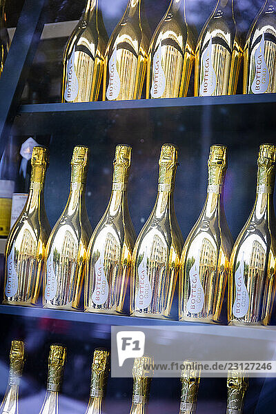 Bottega Prosecco bottles lined up in a display case. Bottega Gold  the world s best-selling sparkling wine in the travel trade