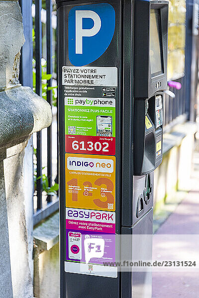 Paris  ?le-de-France  Mobile parking payment terminal  with different operators. PayByPhone. Indigo Neo and EasyPark.